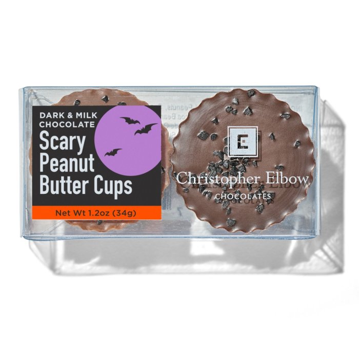 Packaged chocolate peanut butter cups with 'Christopher Elbow Chocolates' branding on a white background