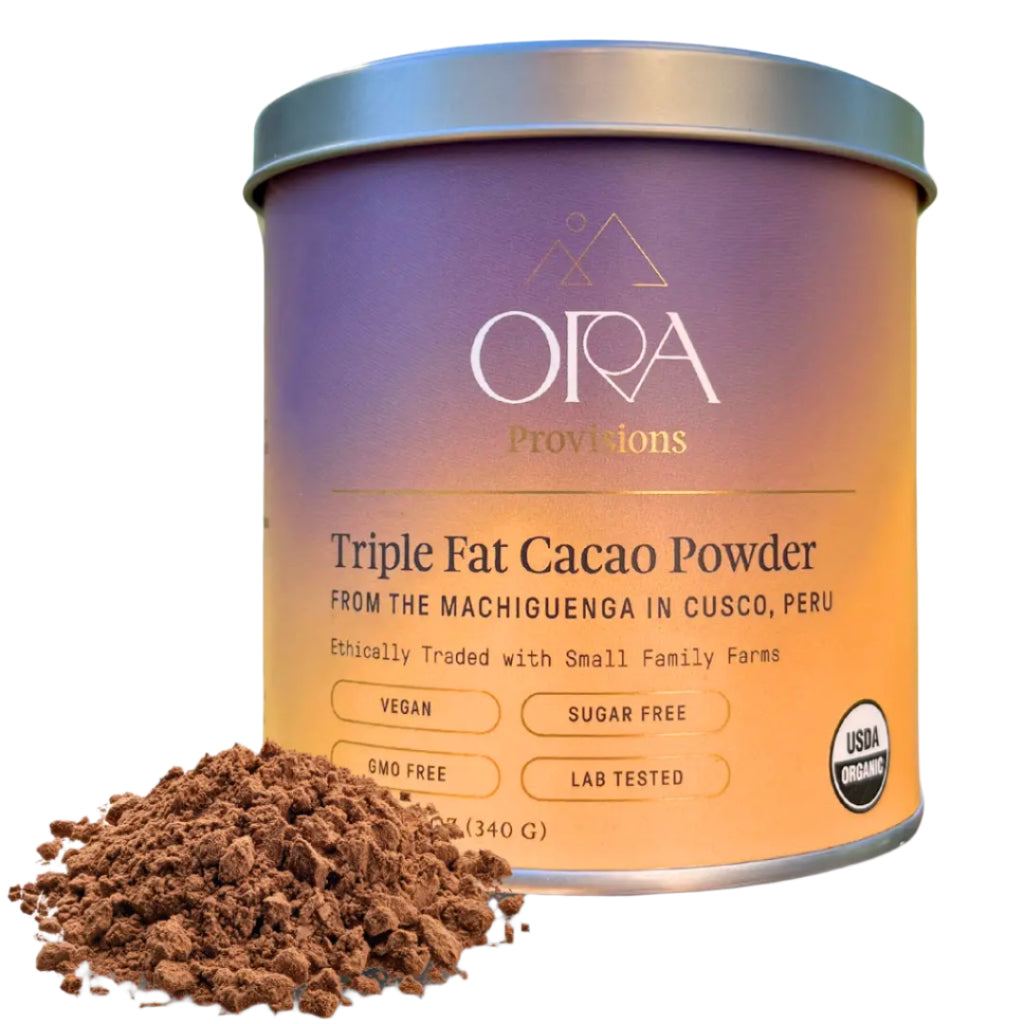 Ora Provisions Triple Fat Cacao Powder container with cacao powder spilling out on a white background