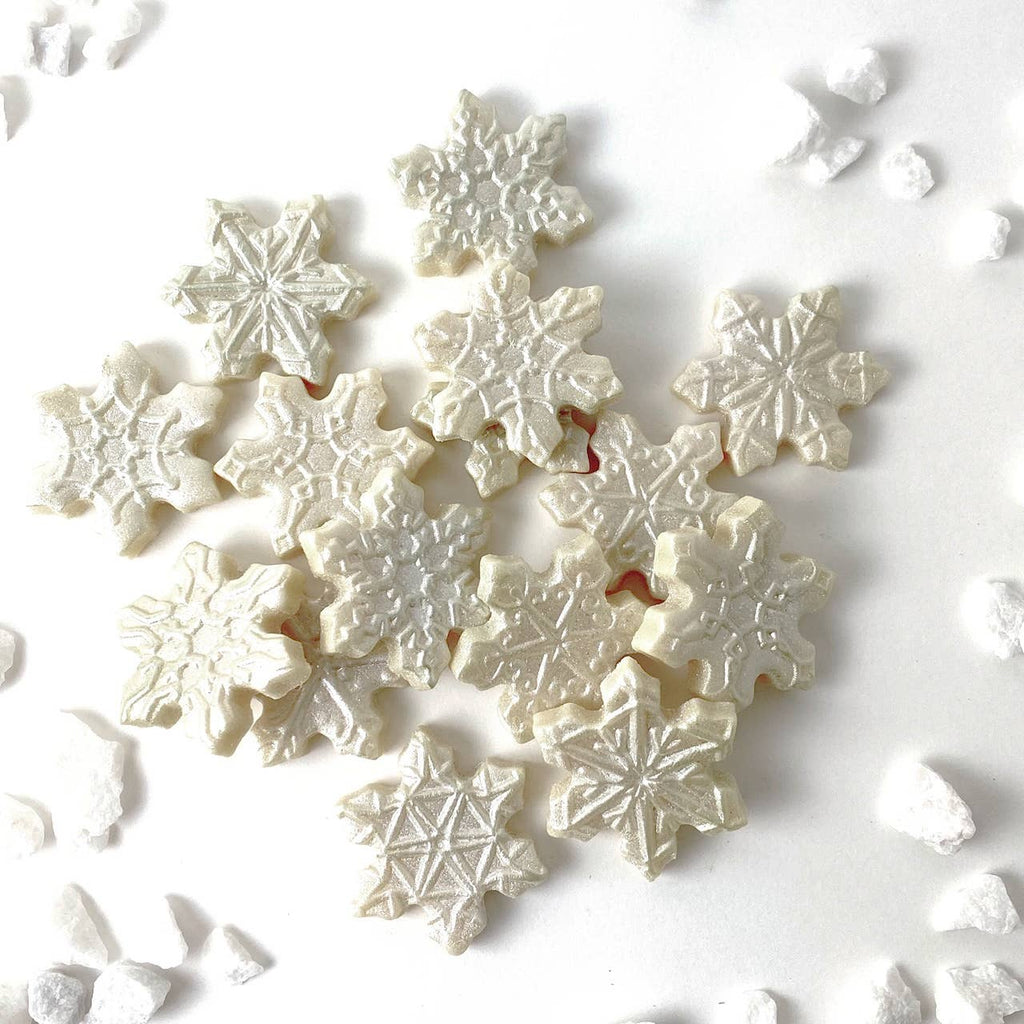 Unwrapped Christmas & Winter Candy Snowflakes on a white table