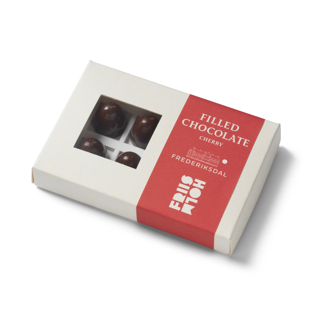 A box of Filled Chocolate "Frederiksdal" Cherry (8 pcs) from Friis Holm against a white background