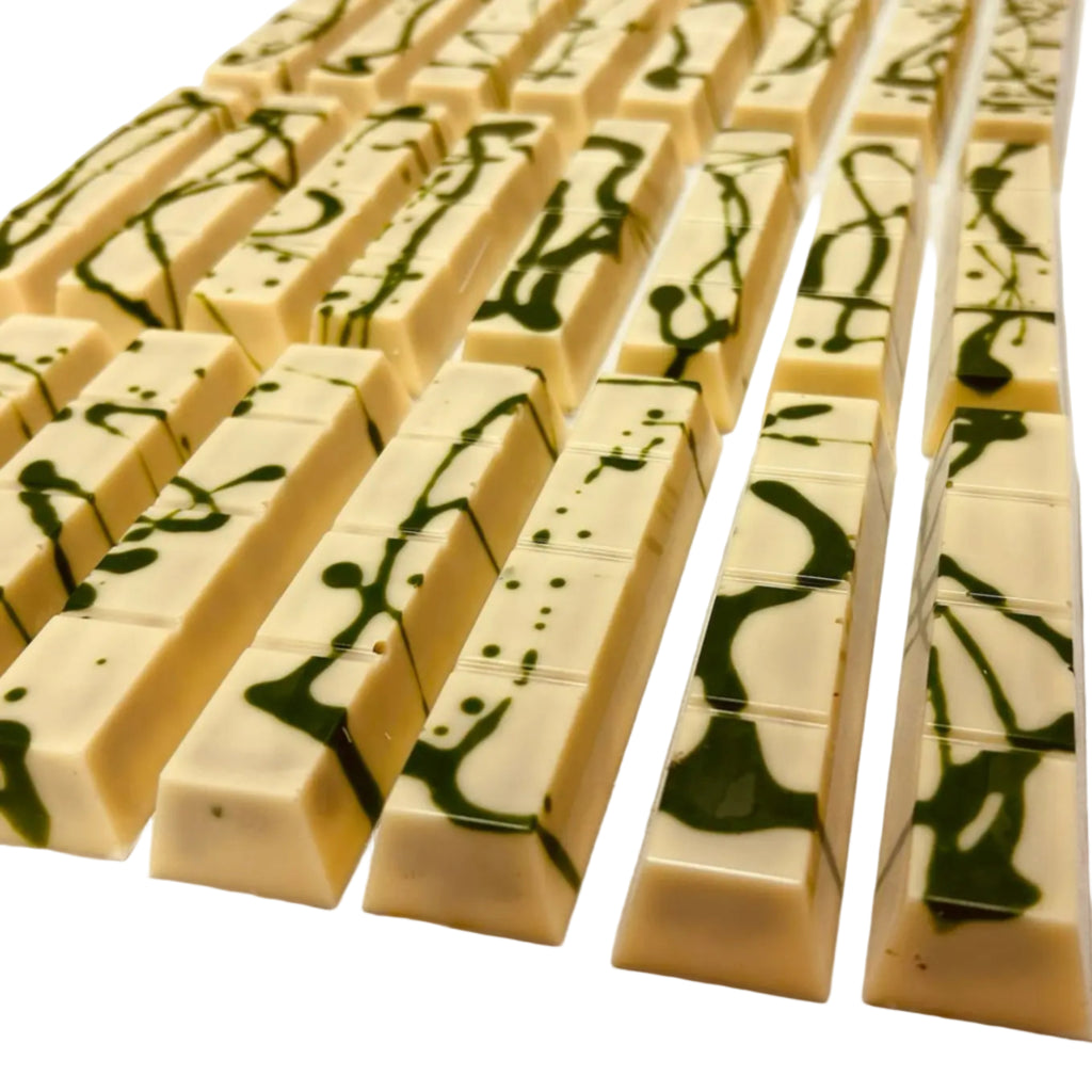 DAR White Chocolate Dubai Bars against a white surface