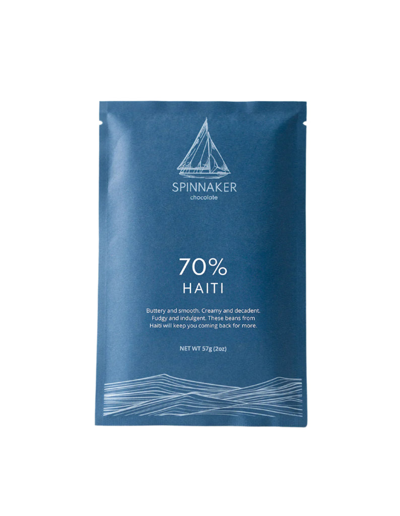 The front of a wrapped 70% Haiti bar from Spinnaker Chocolate against a white background