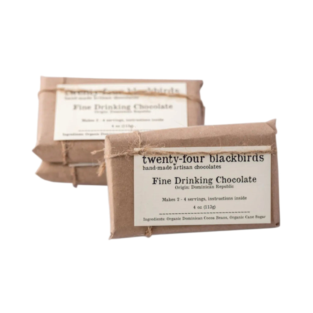 Two bars of 'twenty-four blackbirds' fine drinking chocolate on a white background