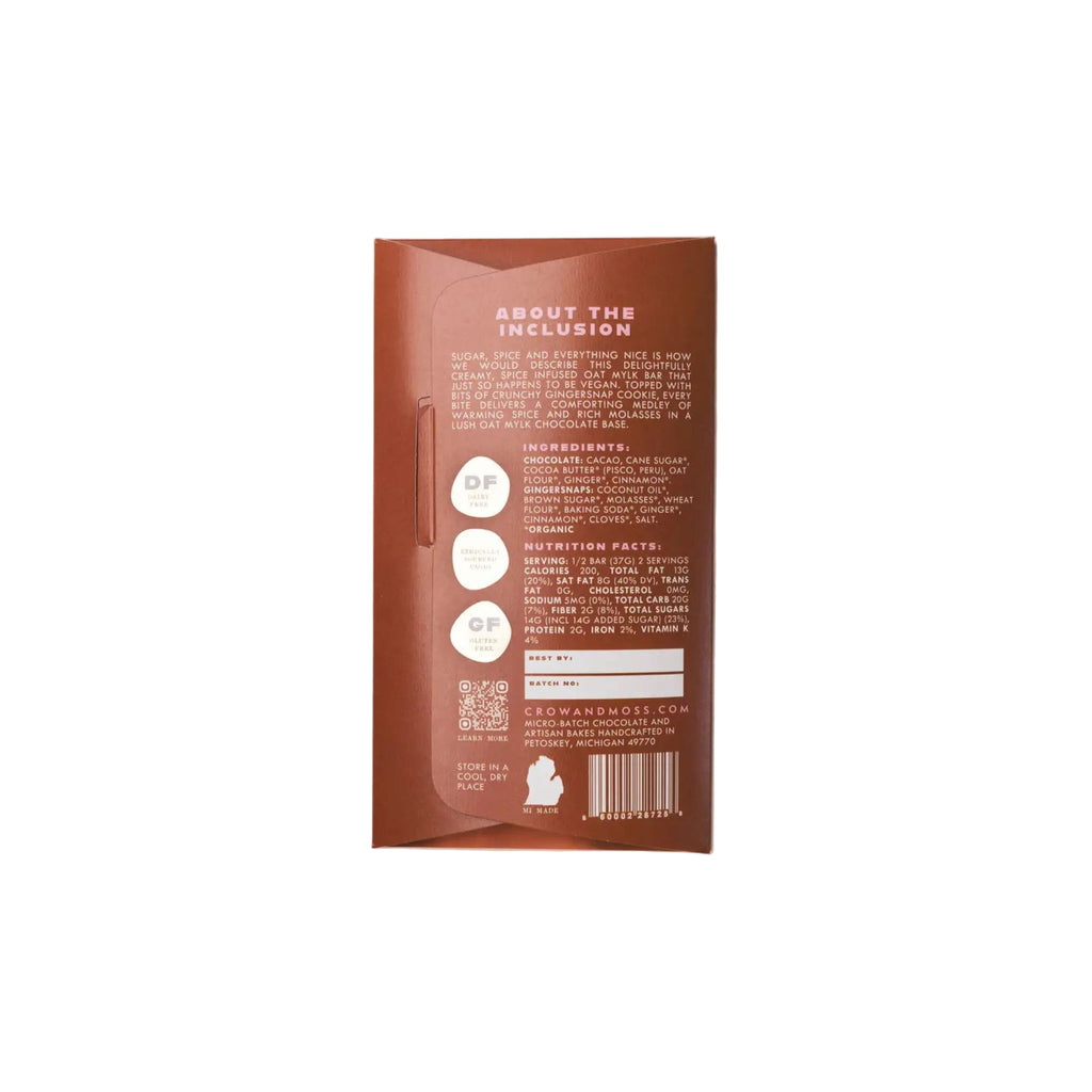 Back view of a Gingersnap Cookie + Oat Mylk Bar 40% chocolate bar packaging with ingredients and nutrition information against a light background