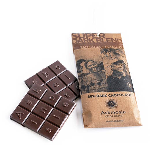 Askinosie Super Dark Chocolate Bar with brown paper wrapper on a white background
