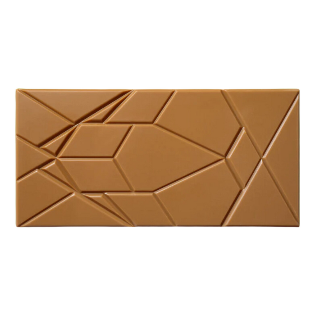 OmNom Chocolate's unwrapped LakkrÍs + Sea Salt White Chocolate Bar at The Chocolate Dispensary, with a white background.