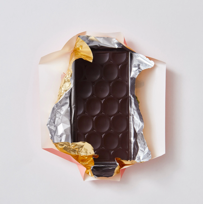 Unwrapped Cookie Chip 60% bar on a white table