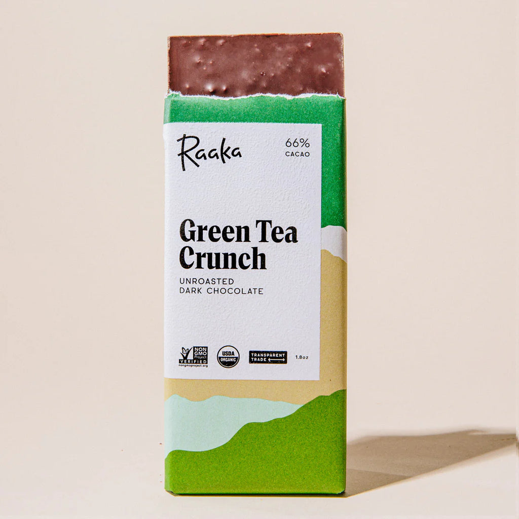 Raaka Green Tea Crunch Unroasted Dark Chocolate 66% wrapper with chocolate bar sticking out