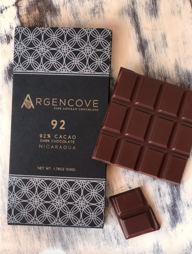 92 Bar 92% on a wooden table