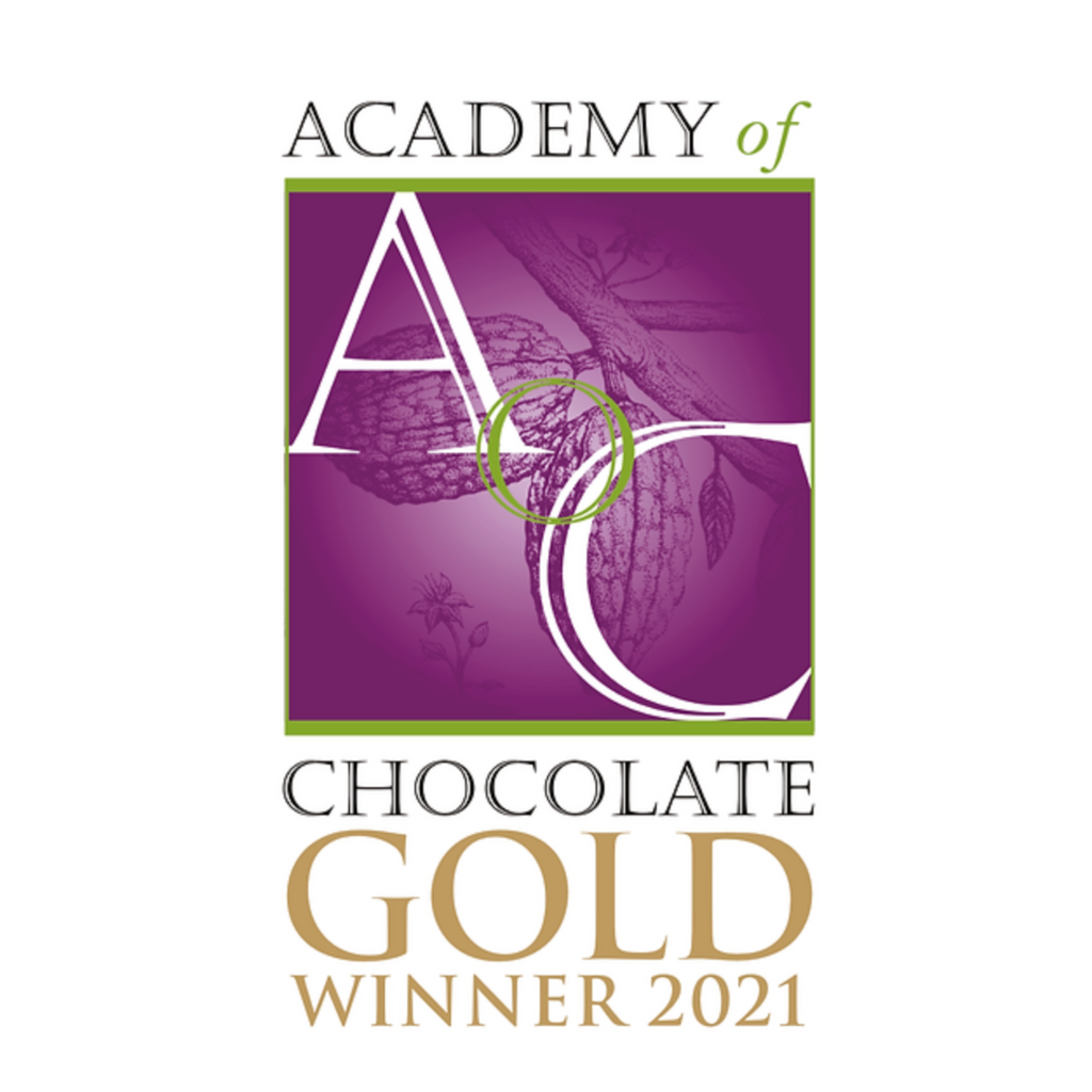 Academy of Chocolate Gold Winner 2021 logo with a purple background and chocolate imagery.