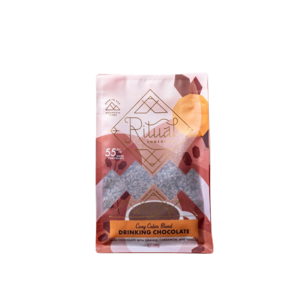 Ritual cozy cabin drinking chocolate packaging agasint a white background