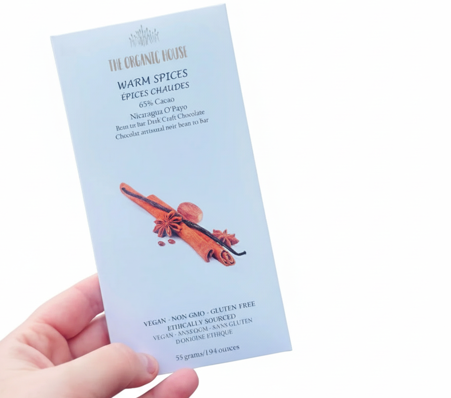 The Organic House Warm spices 65% bar packaging against a white background