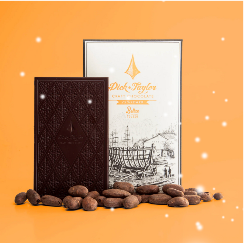 Dick Taylor Belize 72 dark Chocolate bars and packaging  on an orange background