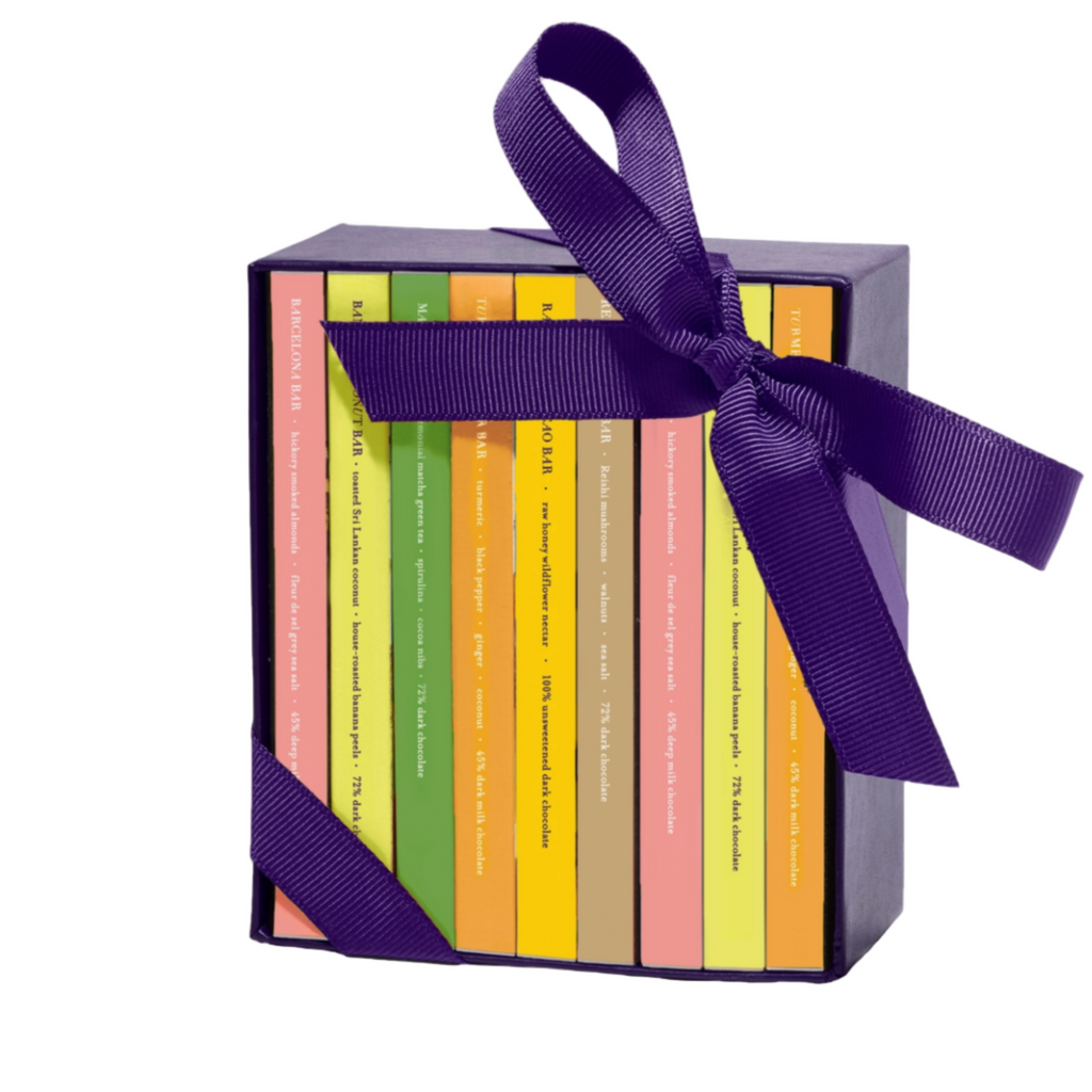 Mini Exotic Chocolate Bar Library gift box  with a purple ribbon on a white background