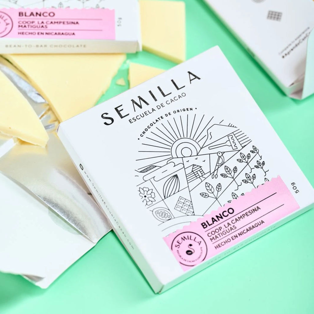 Semilla white chocolate packaging on a white surface
