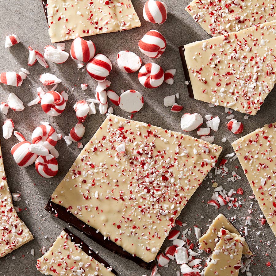 Peppermint Bark broken nto pieces on a grey table