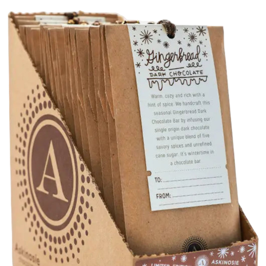 Askinosie Gingerbread Dark Chocolate Bars in a box against a white background