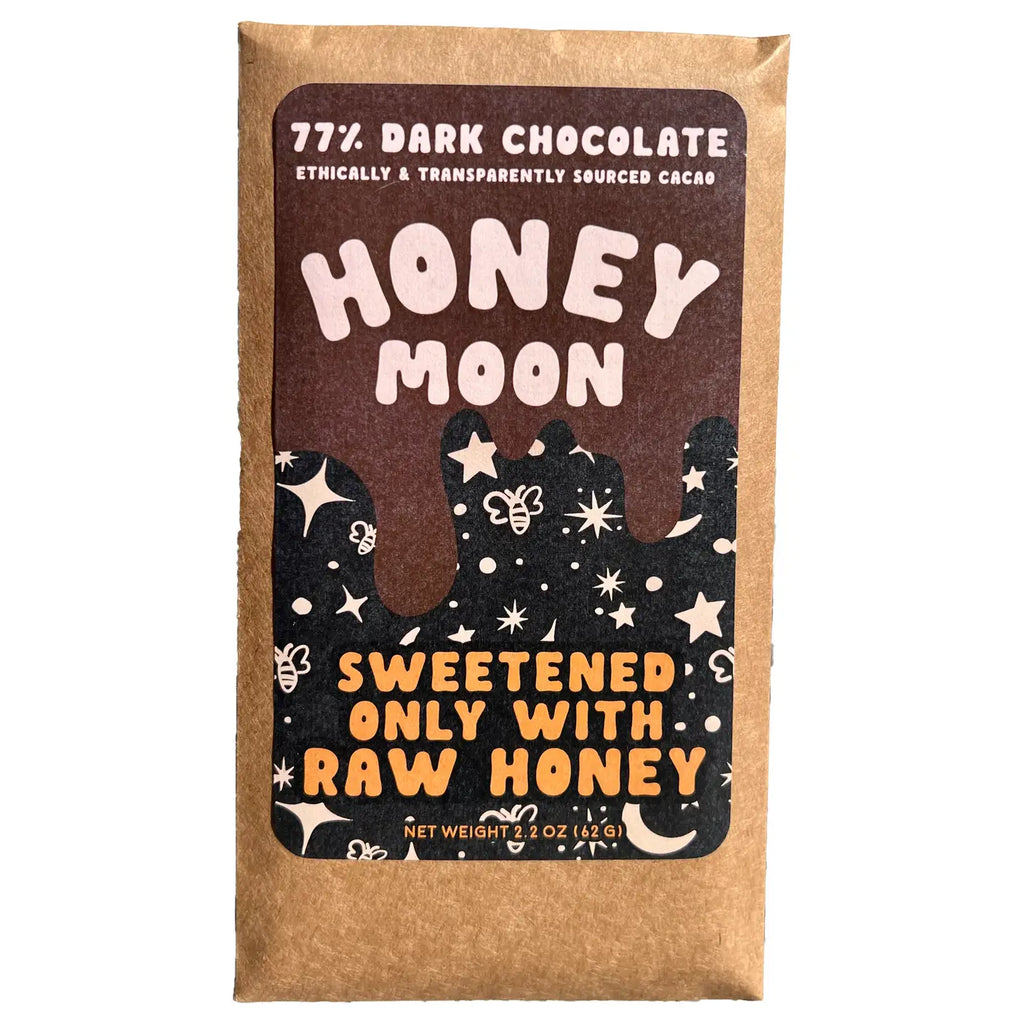 The front of a wrapped 77% Dark Chocolate bar from Honeymoon Chocolates against a white background