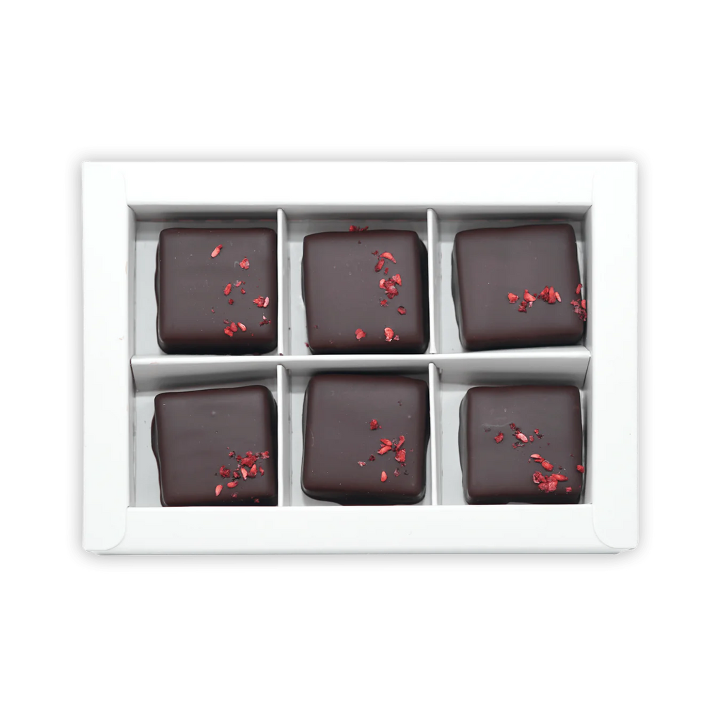 Opened box of Chocolate Coated Raspberry Caramels (6 Pcs) from Fjåk