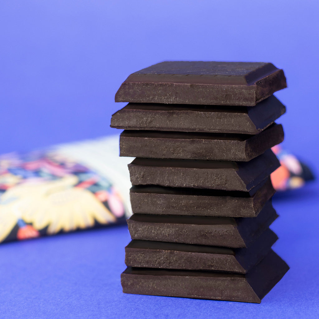 Unwrapped, stacked Seattle Chocolate Mexican Hot Chocolate Truffle Bar at The Chocolate Dispensary